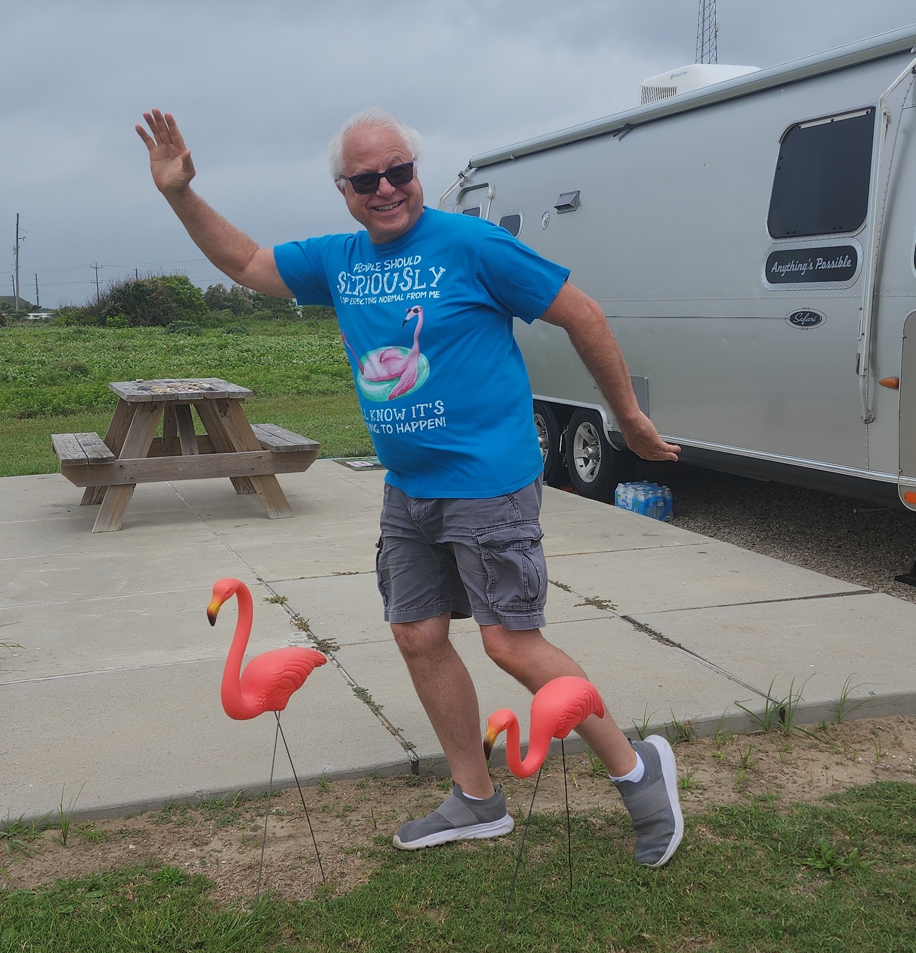 Cregory having a very serious moment with lawn flamingos